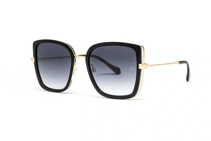 عینک آفتابی کائوچویی پروانه‌ای آناهیکمن فریم مشکی و عدسی سورمه ای طیف دار - عکس از زاویه سه رخ