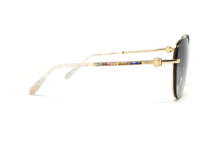 عینک آفتابی زنانه نگین دار شوپارد فریم خلبانی طلایی و سفید و نگین رنگی همراه عدسی سورمه ای - عکس از زاویه کنار