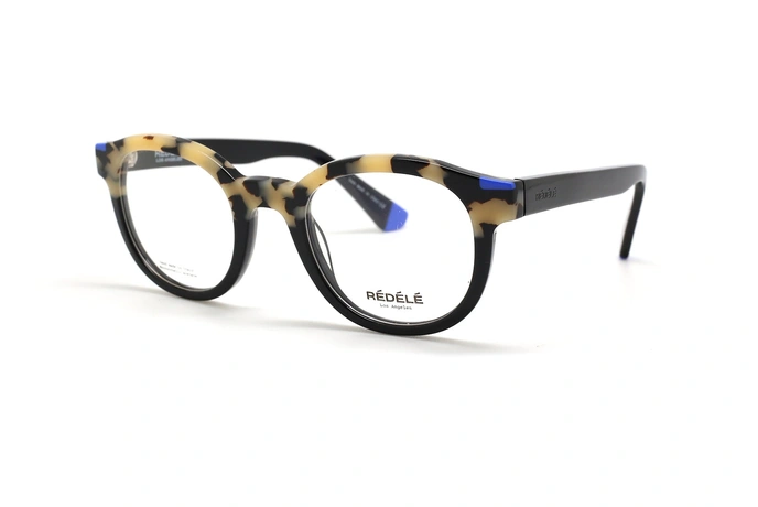 عینک طبی کائوچویی Rédélé فریم کائوچویی مشکی، قهوه ای زرد هاوانا و آبی، حدقه های بیضی شکل - عکس از زاویه سه رخ